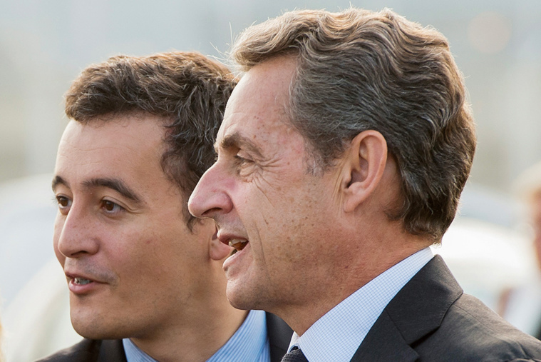 L'ancien président français et candidat à la primaire du parti Les Républicains (LR) en vue de l'élection présidentielle de 2017, Nicolas Sarkozy (à droite), accompagné de son directeur de campagne Gérard Darmanin, arrive pour une visite au port de Calais, dans le nord de la France, le 21 septembre 2016. Crédit PHILIPPE HUGUEN / POOL / AFP