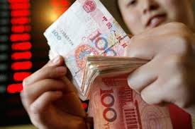 Chine: des mètres cubes de billets de banque retrouvés au domicile d'un haut cadre