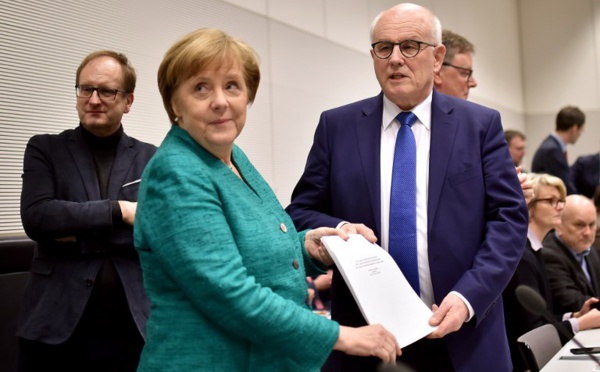 Au prix de lourds sacrifices, Merkel pose les bases d'un 4ème mandat