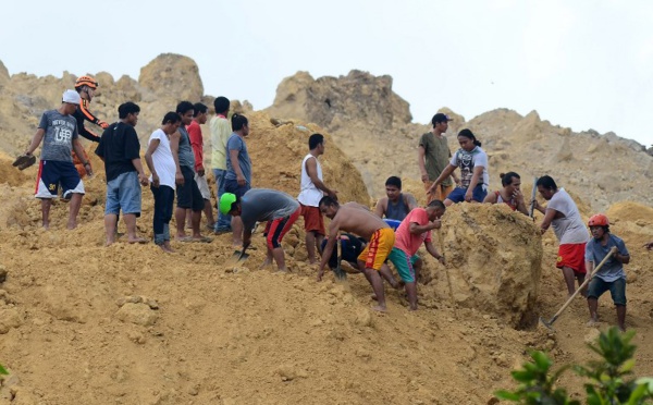 Philippines: au moins 12 morts dans un nouveau glissement de terrain, le bilan du typhon s'alourdit