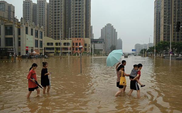 Inondations en Chine: au moins 56 morts, un typhon menace l'est du pays