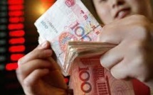 Chine: des mètres cubes de billets de banque retrouvés au domicile d'un haut cadre