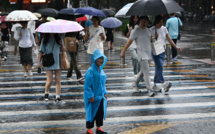 En Chine, des pluies torrentielles font au moins 30 morts, canicule à Shanghai