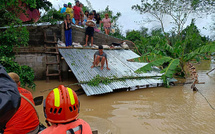 Tempête Trami aux Philippines: quatorze morts et des dizaines de milliers de personnes évacuées